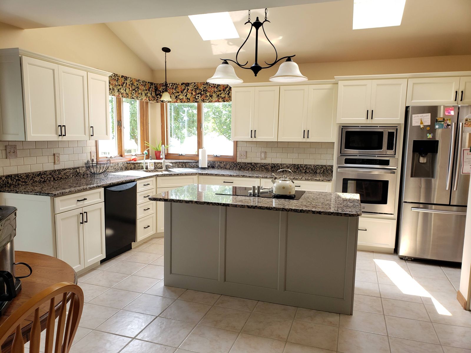 The same kitchen after, white and gray two-tone