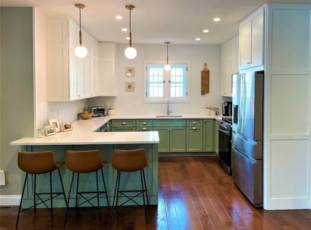 The same kitchen after, white uppers and green lowers